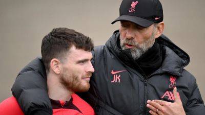 Injured fullback Andy Robertson touch and go for Liverpool's Brighton test