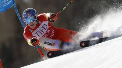 Odermatt uses 2nd-run comeback to claim 12th straight World Cup giant slalom win