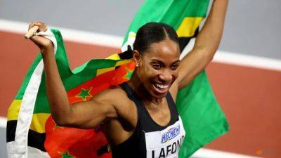 LaFond flies to Dominica's first world athletics gold medal