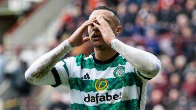 Adam Idah sees penalty saved as Hearts down 10-man Celtic at Tynecastle