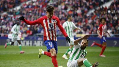 Atletico return to winning ways with 2-1 victory over Betis