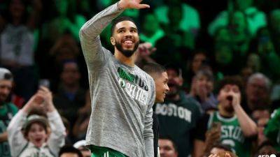 Celtics overwhelm Warriors while Clippers edge Timberwolves