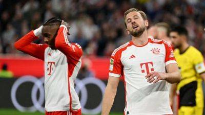 Manuel Neuer - Harry Kane - Bayer Leverkusen - Sven Ulreich - Bayern Munich's title hopes in tatters after 2-0 loss to Dortmund - channelnewsasia.com - Germany