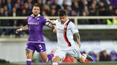 Milan edge Fiorentina 2-1 on emotional night in Florence