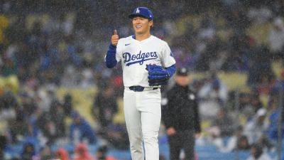 Yoshinobu Yamamoto sharp after rocky debut, but Dodgers lose - ESPN