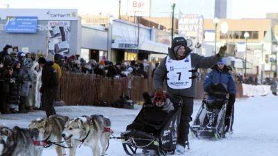 5-time Iditarod champion shoots dead, guts moose during the annual sled dog race
