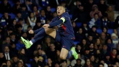 Paris St Germain - Lee Kang - Mbappe double fires PSG into Champions League quarters - channelnewsasia.com - France - Spain - county Sebastian