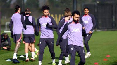 Liverpool's Salah returns to training after two-week absence with hamstring injury