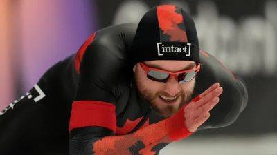 Canada's Laurent Dubreuil sits in top spot of sprint event at speed skating worlds