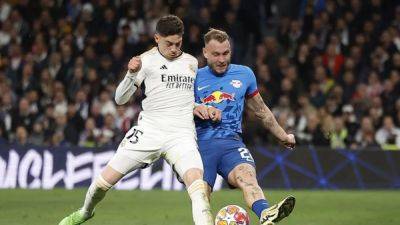 Real Madrid snatch draw to qualify for Champions League quarters