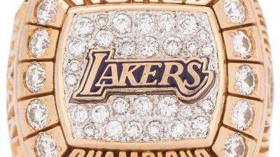 Kobe Bryant - Lakers NBA title ring Kobe Bryant gifted to father sells for $927K - ESPN - espn.com - Los Angeles
