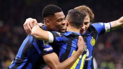 Inter close in on title with 2-0 win over Empoli