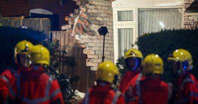 LIVE: Dramatic pictures show wall falling away after car smashes into house - latest updates