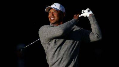 Tiger Woods 1 over, 8 shots back after 1st round at the Masters - ESPN