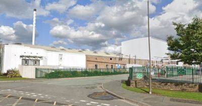 Boy, 16, rushed to hospital after assault at industrial estate as police cordon off area