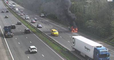 M4 car fire causes delays on motorway - live updates