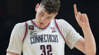 Zach Edey - Dan Hurley - UConn center Donovan Clingan entering NBA draft - ESPN - espn.com - state Connecticut