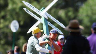 Max Homa - Bryson DeChambeau moves sign while on 13th hole of the Masters - ESPN - espn.com