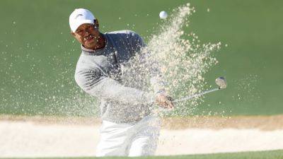 Tiger Woods not giving up on Masters after making record cut