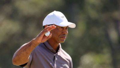 Woods in position to break Masters record for made cuts