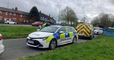 Baby's remains found at Wigan home before five people arrested