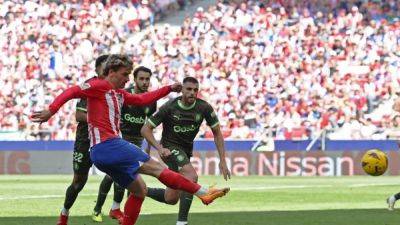 Griezmann at the double as Atletico recover to outclass Girona