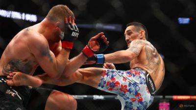 Dana White - Max Holloway - Alex Pereira - Holloway's knockout cements UFC's dominant position - channelnewsasia.com