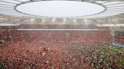 Leverkusen secure first Bundesliga title win a 5-0 win