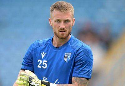 Gillingham goalkeeper Jake Turner grateful for the support from Glenn Morris as he resumes place in the team – League 2 play-off chase remains alive after win over Barrow