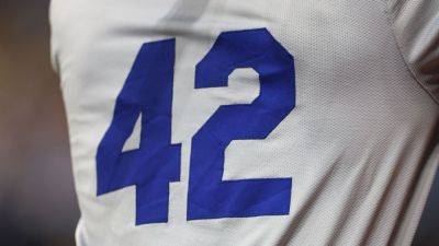 Across MLB, Jackie Robinson's 'strength, courage' hailed on his day - ESPN