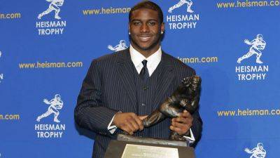 USC legend Reggie Bush receives support from Notre Dame great in quest to reclaim Heisman Trophy