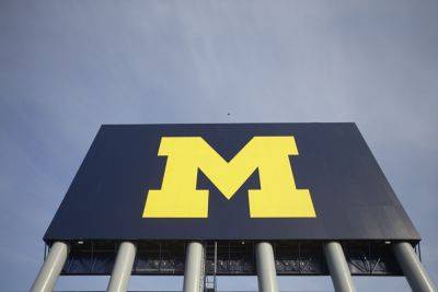 Michigan football placed on probation, fined for recruiting violations after NCAA agreement