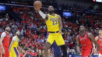 Anthony Davis - Denver Nuggets - Nikola Jokic - LeBron's Lakers edge Pelicans to book playoff clash with Nuggets - channelnewsasia.com - Los Angeles - county Williamson