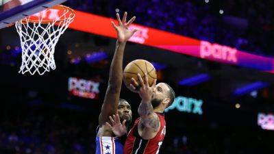 Tyrese Maxey - Tyler Herro - Nick Nurse - Sixers beat Heat to book playoff date with Knicks, Bulls rout Hawks - channelnewsasia.com - New York - Los Angeles - Philadelphia