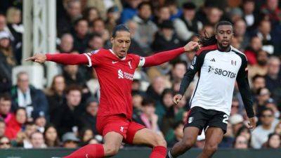 Liverpool beat Fulham 3-1 to climb level with Arsenal