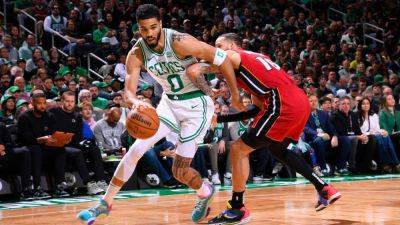 Caleb Martin - Kristaps Porzingis - Jayson Tatum - Jaylen Brown - Joe Mazzulla - Jayson Tatum sparks Celtics to win over Heat, downplays fall - ESPN - espn.com