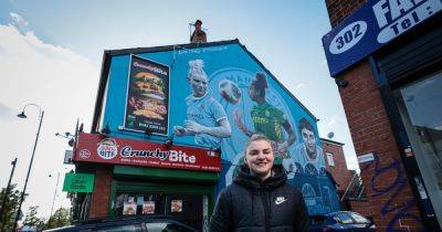 Chelsea Nightingale beams next to stunning new Manchester City mural unveiled at side of building in Fallowfield