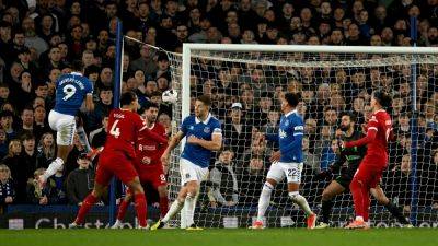 Liverpool's title hopes wither in rare Merseyside derby defeat