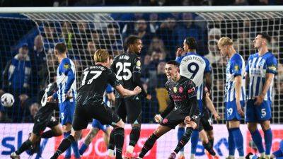 Man City crush Brighton to maintain title charge