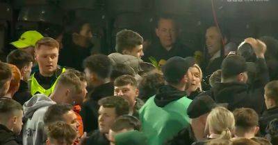 Dundee United pitch invasion leaves BBC team scrambling for the stands as title party chaos spills over on air