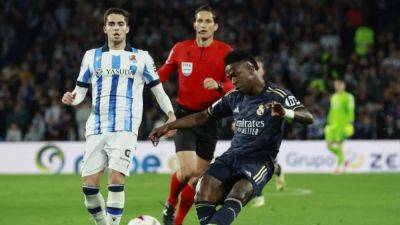 Real edge closer to title with win at Sociedad