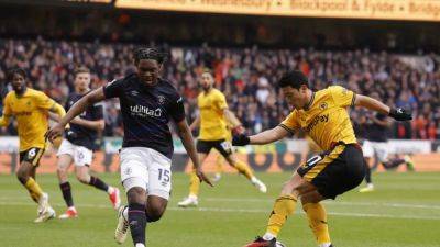 Wolves dent Luton's Premier League survival hopes with 2-1 win