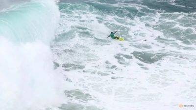 Surfing-World record holder Steudtner finds peace in chaos