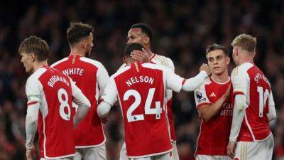 Arsenal reclaim top spot with comfortable win over Luton