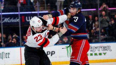 Rangers-Devils opens with brawl involving all 10 skaters - ESPN