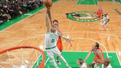 Kristaps Porzingis - Jayson Tatum - Jaylen Brown - Celtics clinch NBA's best record with runaway win against OKC - ESPN - espn.com