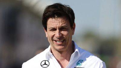 Motor Racing-Mercedes not ruling out Vettel bid, Wolff says