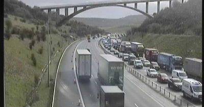 LIVE: Huge M62 queues with HOUR delays due to 'overturned car' - latest updates
