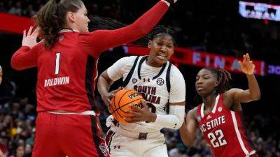 Caitlin Clark - Paige Bueckers - Kamilla Cardoso's double-double helps South Carolina past NC State en route to title game - cbc.ca - state North Carolina - county Dallas - state Iowa - state South Carolina