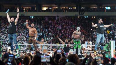Jason Kelce, Lane Johnson shock crowd with cameo in WrestleMania 40 - ESPN